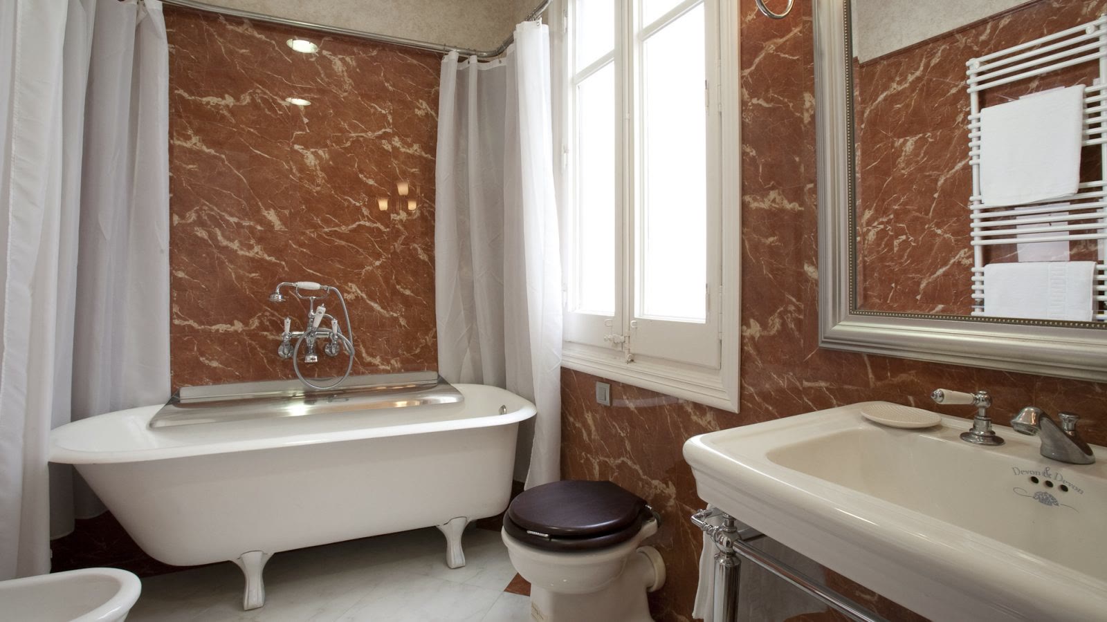 Bathroom with freestanding bath at Via Laietana