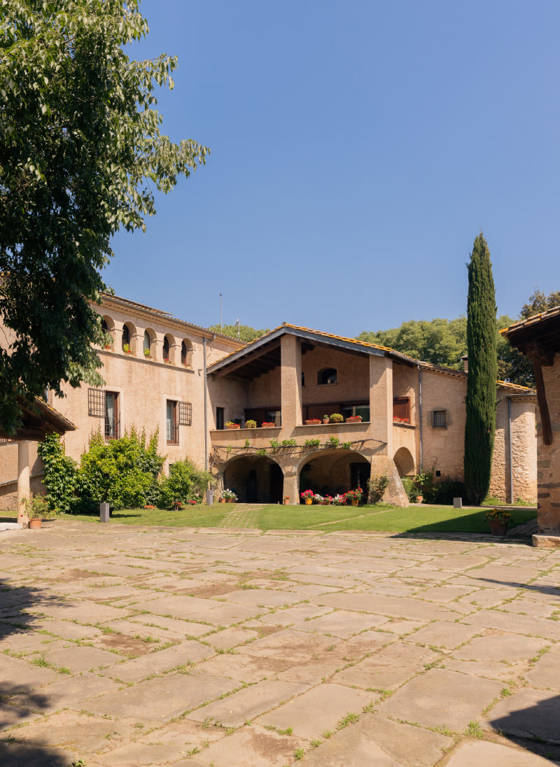 Farmhouse seen from the lawn at Mas Simon