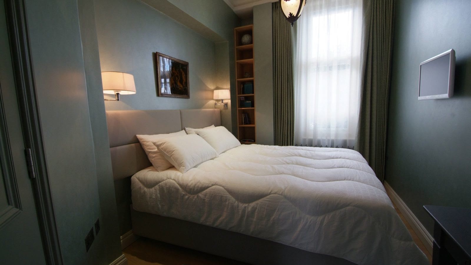 Double bedroom with curtains at Chelsea, London